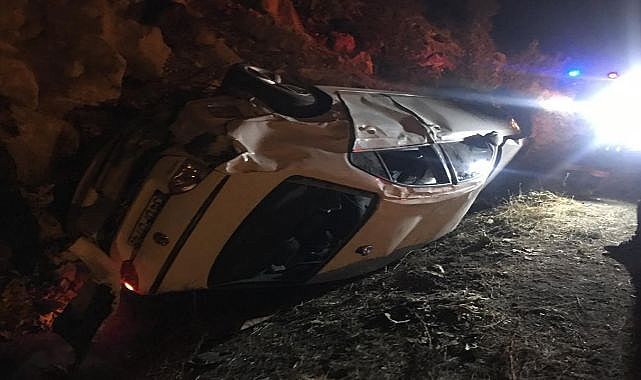 Otomobil takla atarak yan yattı